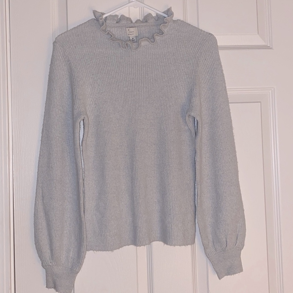 Grey knitted sweater